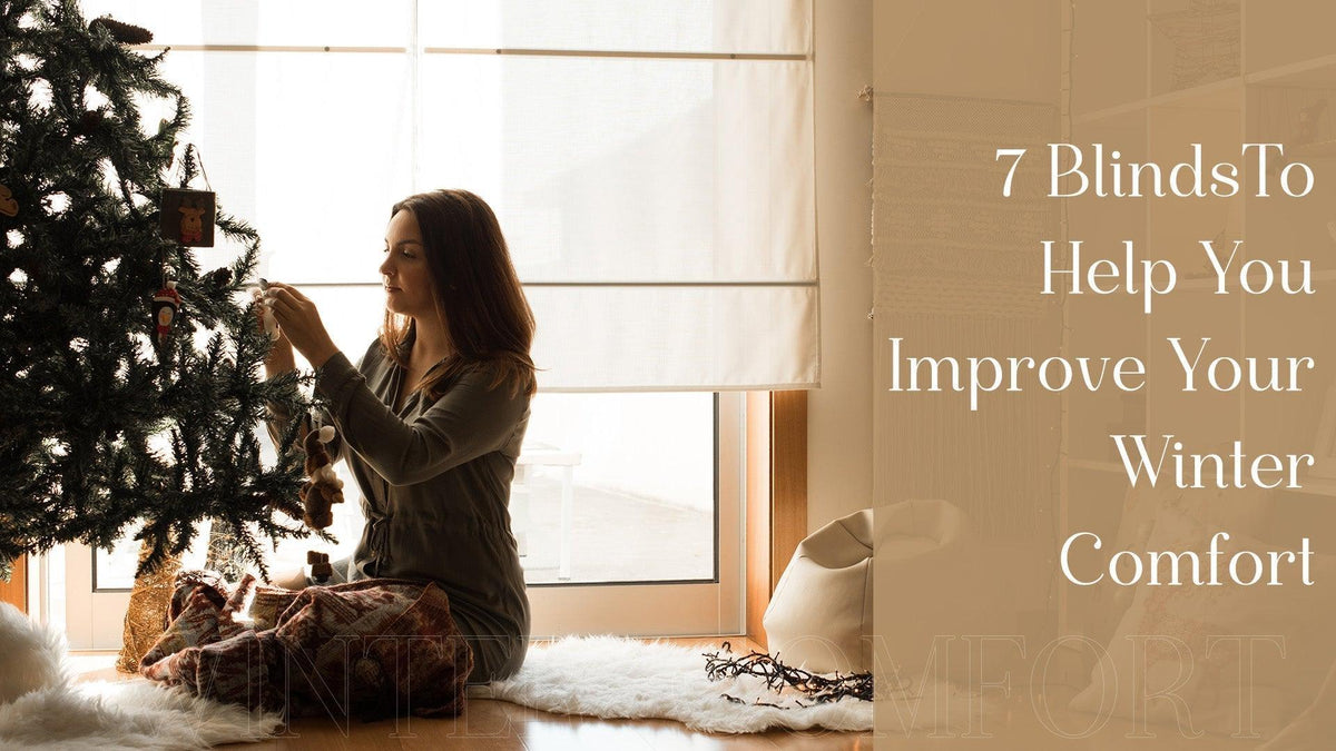 Woman decorating Christmas tree near window with white roman blinds, cozy winter home setting