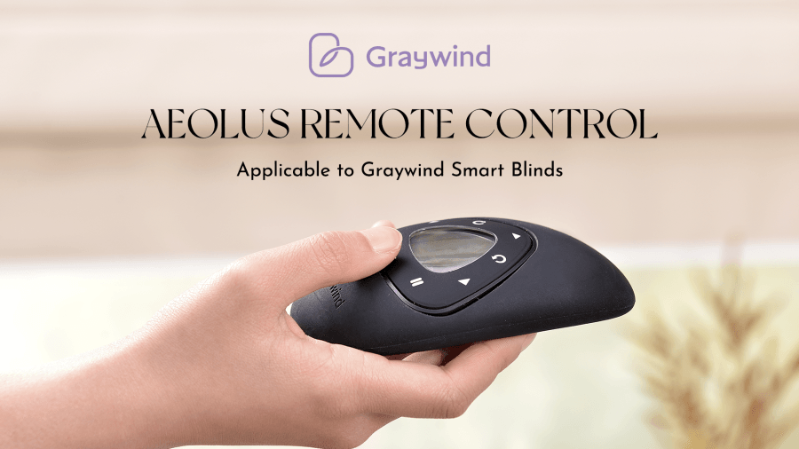 Hand holding Aeolus remote control for smart blinds, modern home automation device