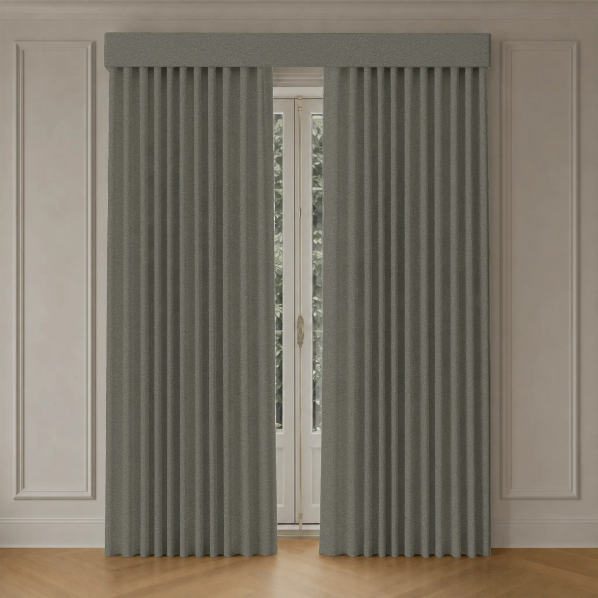 Pair of blackout curtains in a room with light-colored walls and wooden floor.
