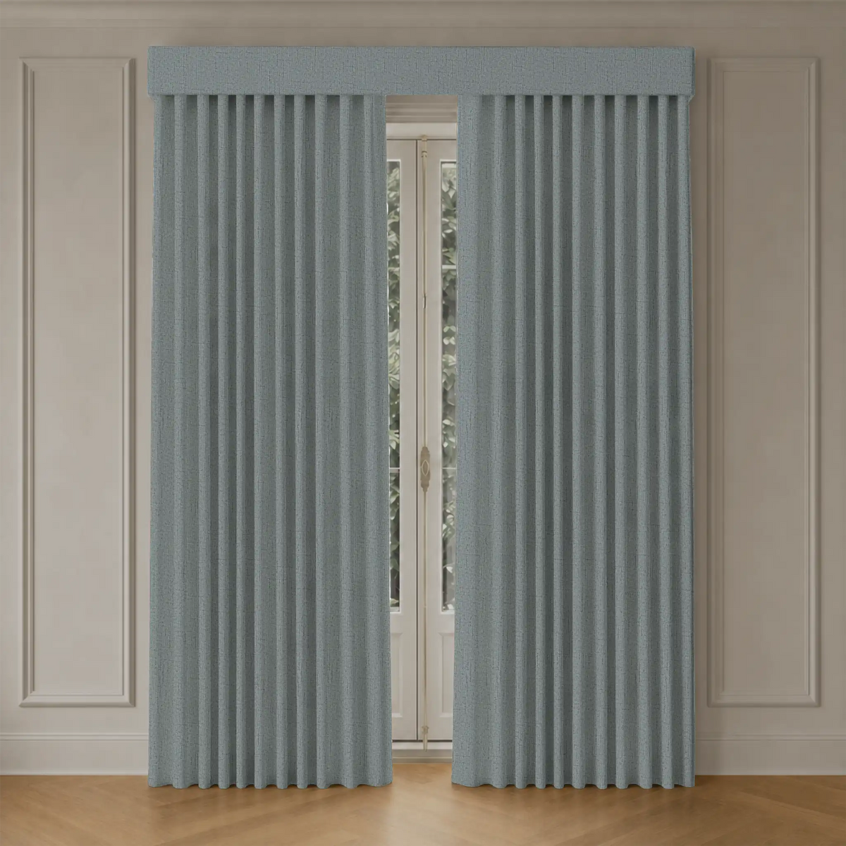 Pair of custom blackout curtains on a window with beige walls and wooden floor.