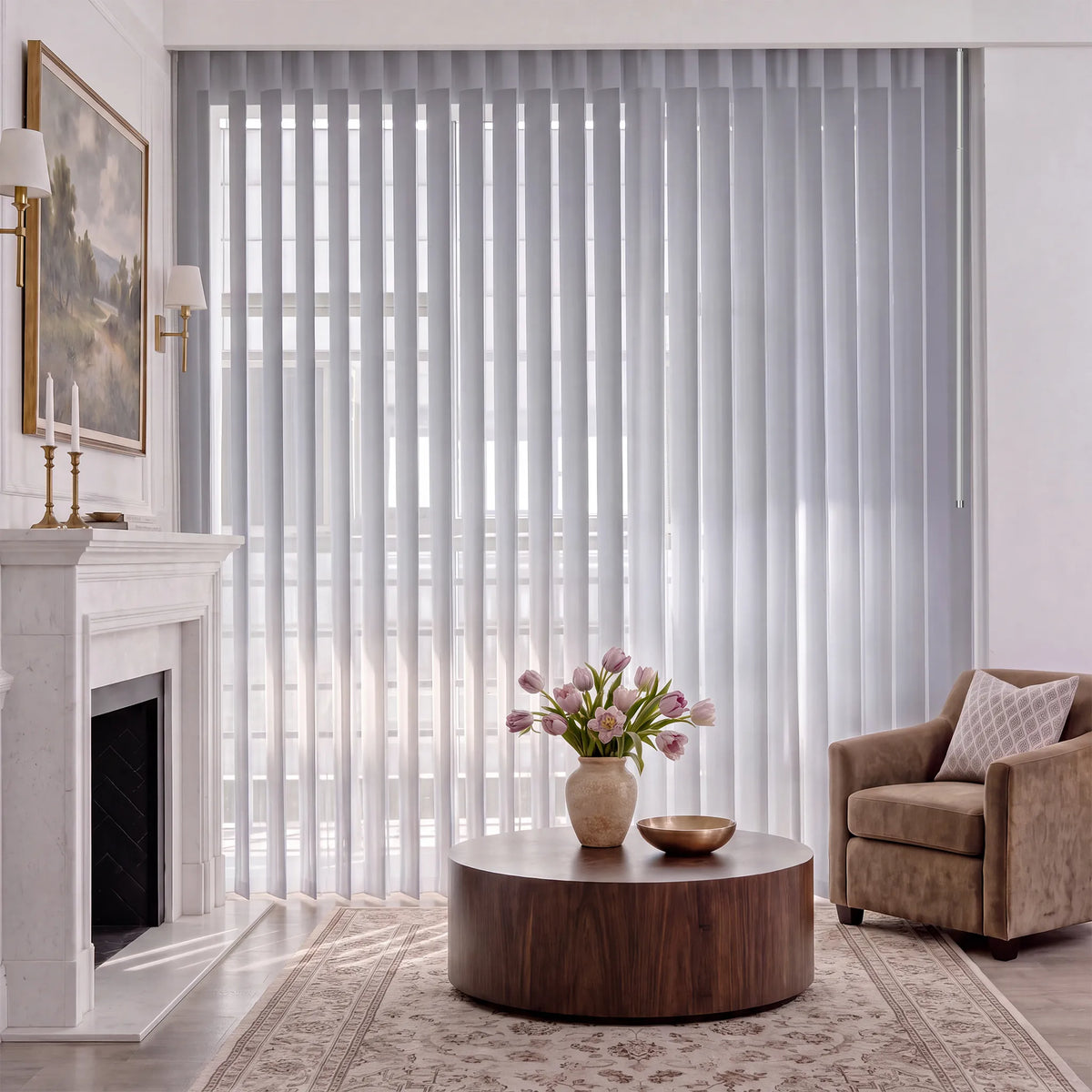 A pair of light gray manual Sheer Vertical Blinds hanging on a large window in a modern dining room with a wooden table, chairs, and a sideboard.