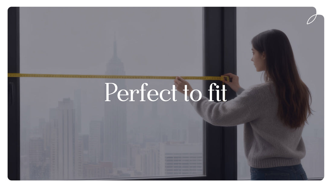 Woman measuring large window with tape measure, city view outside, custom window treatments