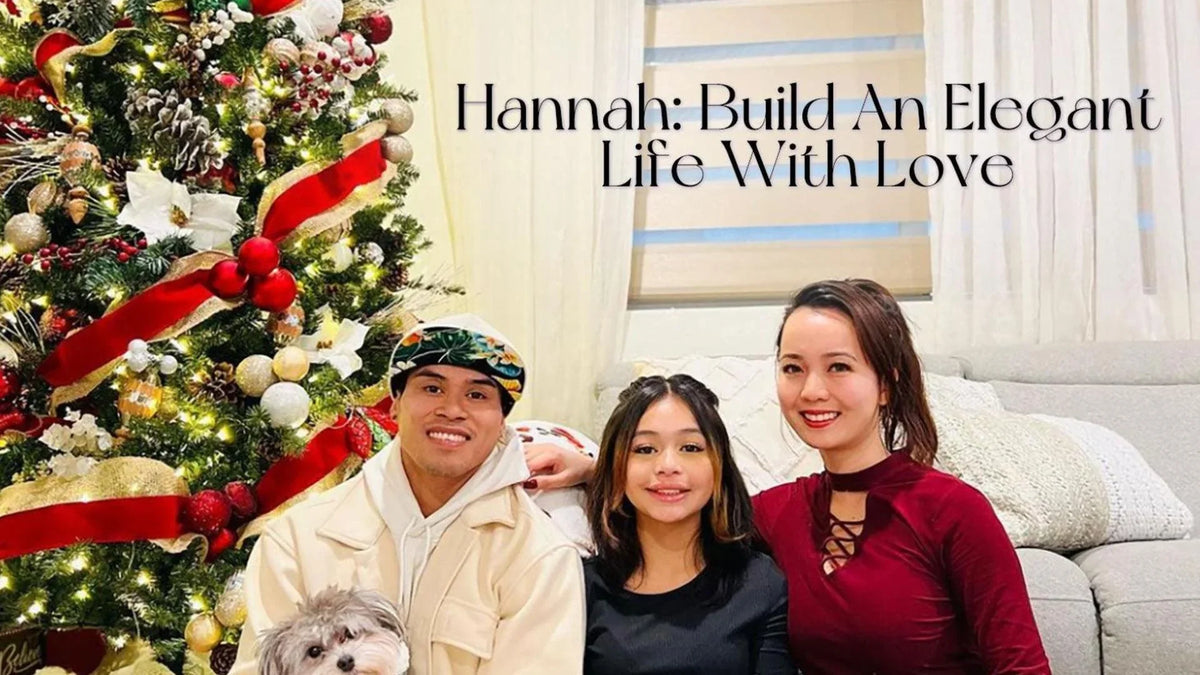Family with a dog sitting by a Christmas tree and modern layered window shades in a bright living room