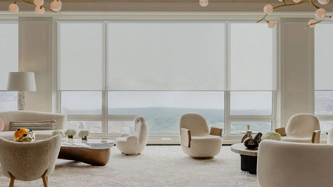 A large-windowed living room scene with coupled shades