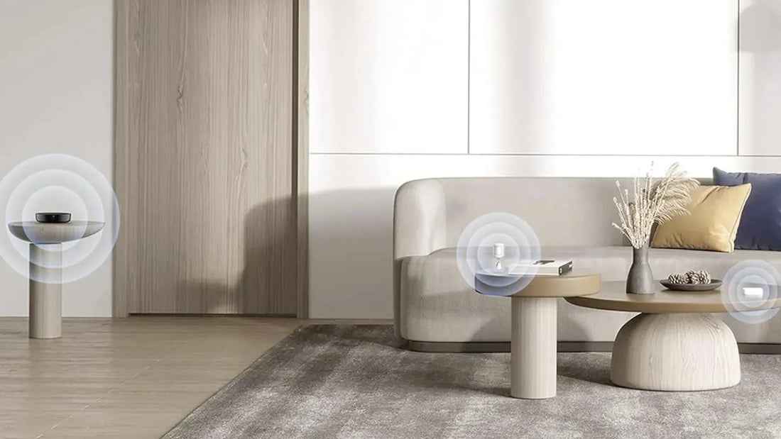 Smart hub controlling window blinds, white device on table and SmartThings hub on shelf