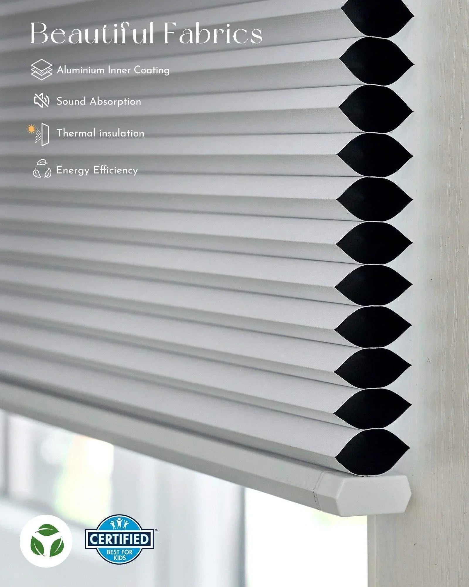 Close-up of white honeycomb window shade with energy efficient, thermal insulation features.