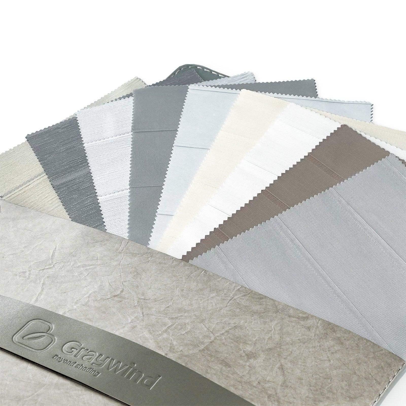 Assorted neutral window shade fabric swatches for custom smart blinds sample display