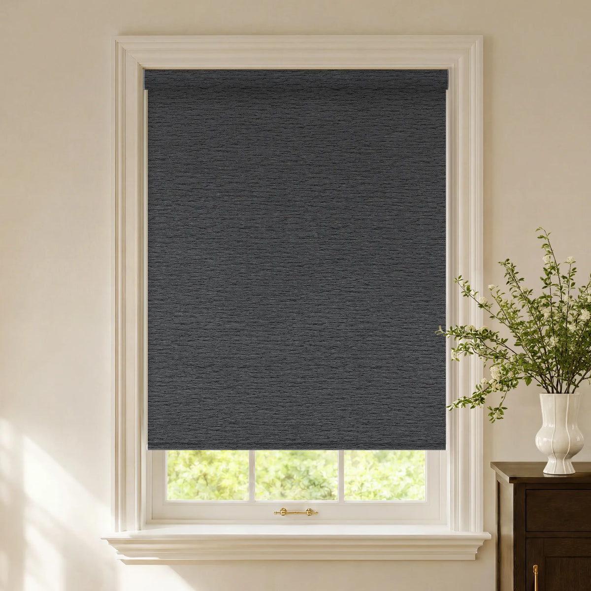 Frequency Nero blackout roller shades with a modern textured design fabric