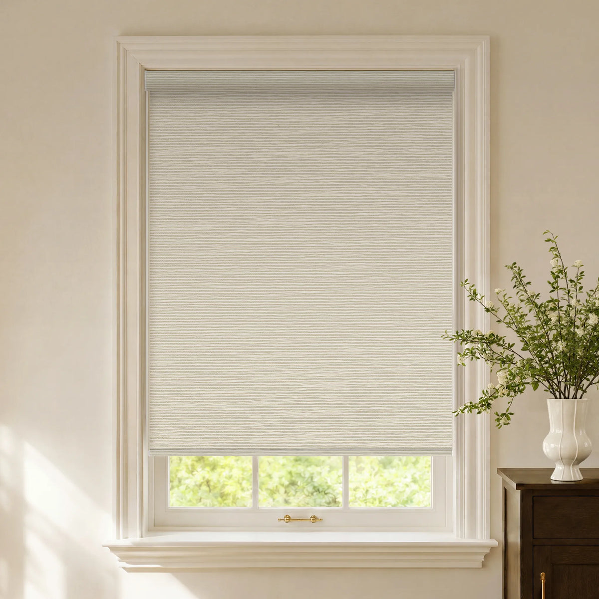 Striped beige blackout roller shades with a soft decorative fabric pattern