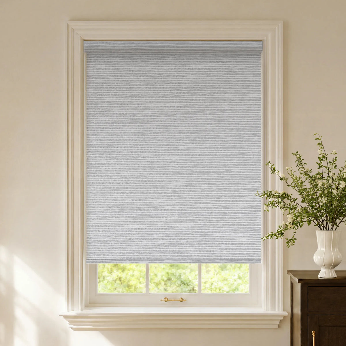 Light grey striped blackout roller shades with a subtle contemporary pattern
