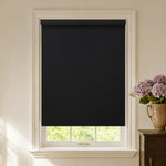 Black fabric blackout roller shades for strong privacy and light blocking
