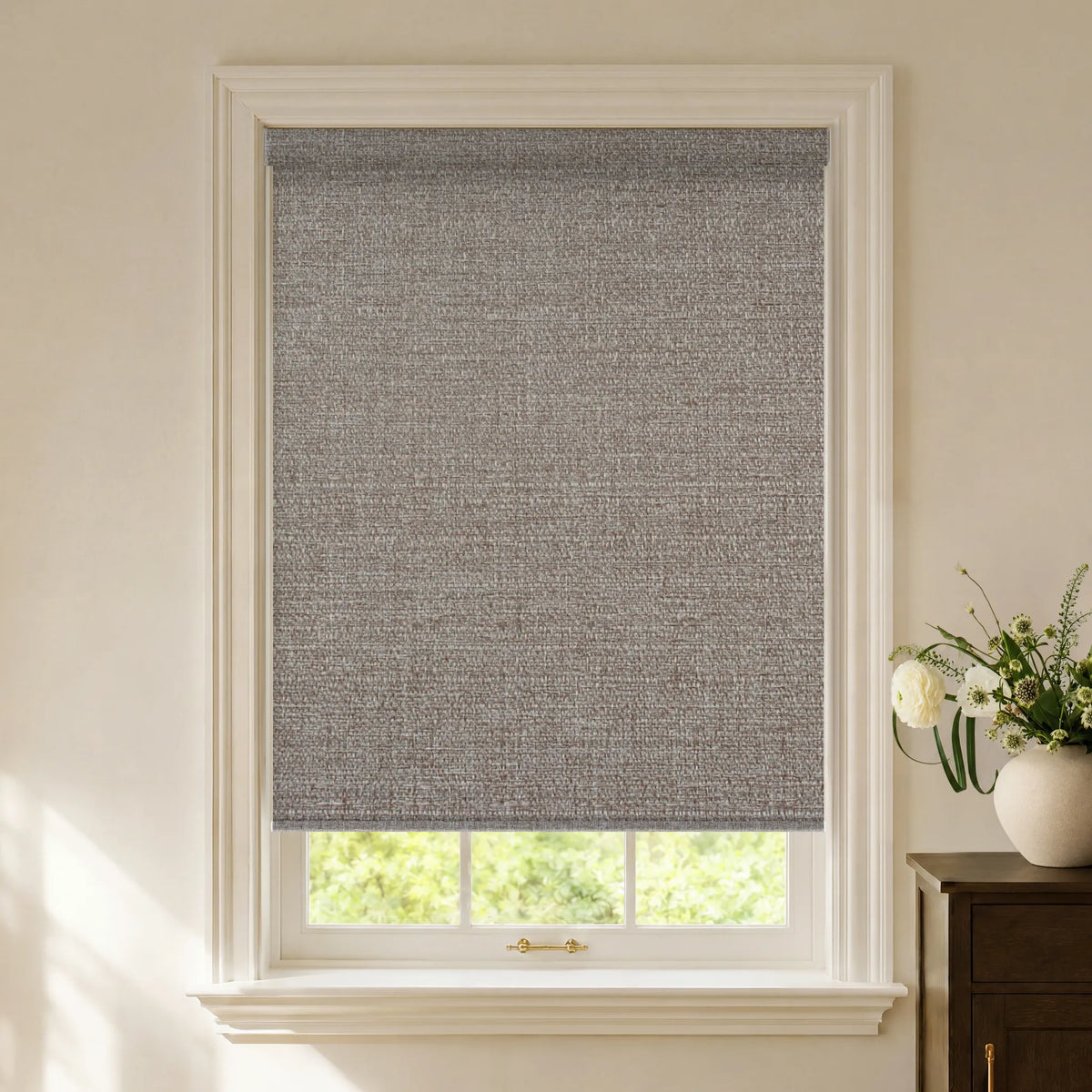 Grey brown textured blackout roller shades with a warm woven look
