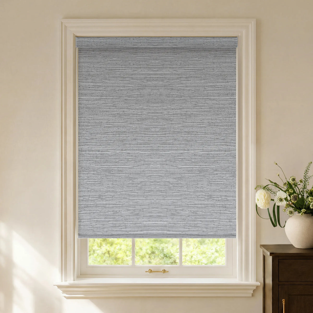 Grey jacquard textured blackout roller shades with refined patterned fabric