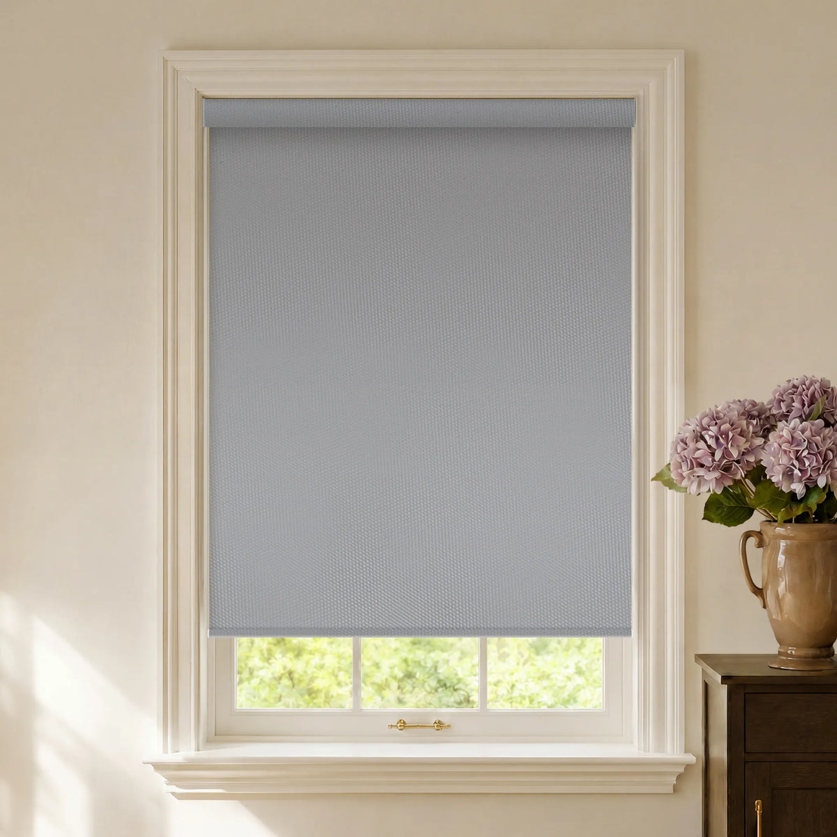 Light grey vinyl blackout roller shades for clean privacy and room darkening
