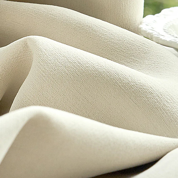 Blended fabrics bring together softness and practicality, often with added texture and visual depth. They suit homes that want something easy to live with, yet more elevated in feel.