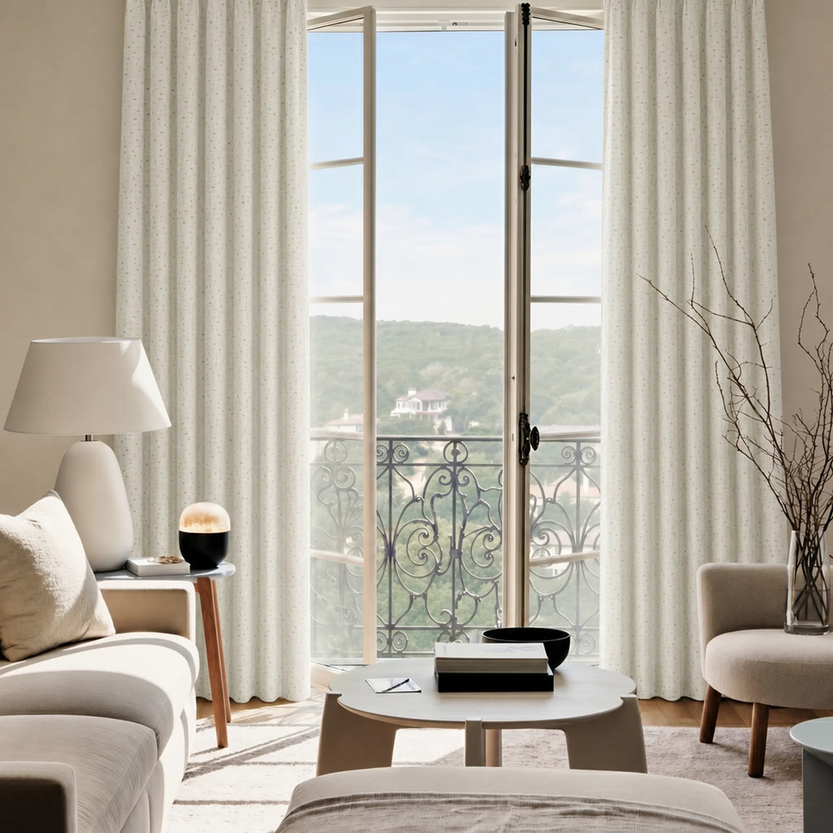 Modern living room with large windows, white motorized curtains, and neutral decor.