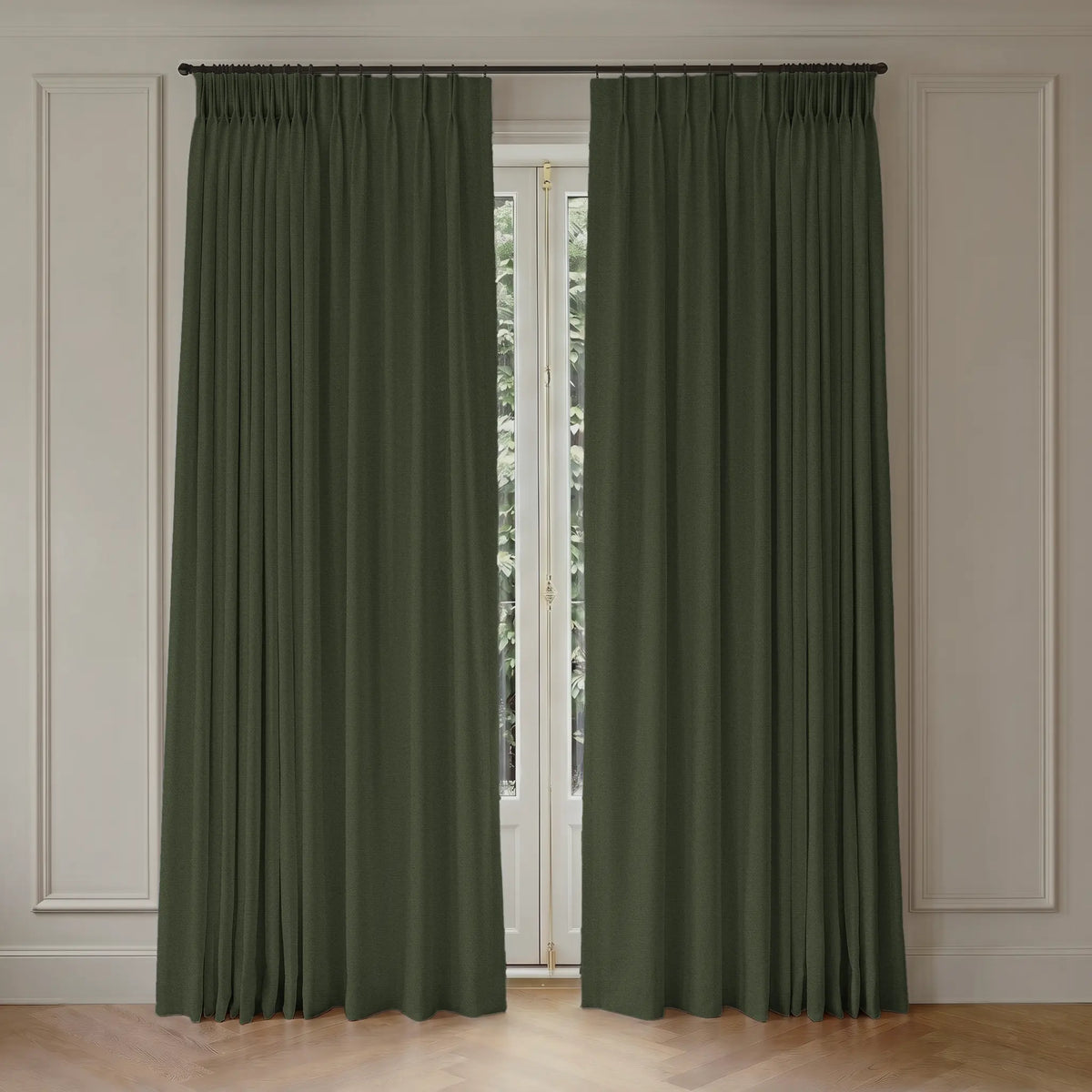 Pair of custom blackout curtains hanging in front of a window with white trim.