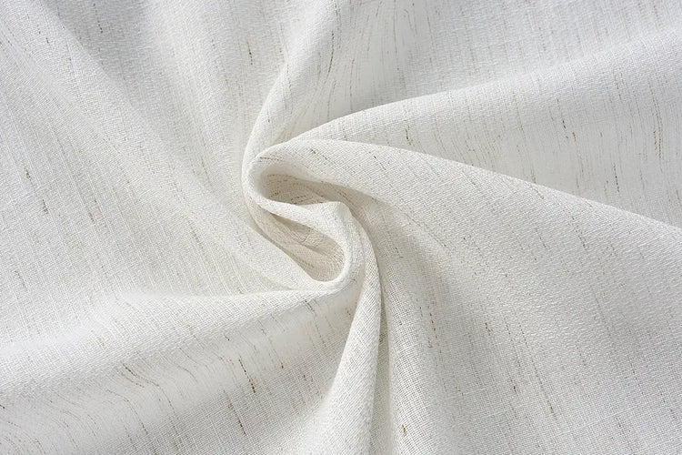 White sheer curtain fabric that filters natural light for Graywind motorized curtains.