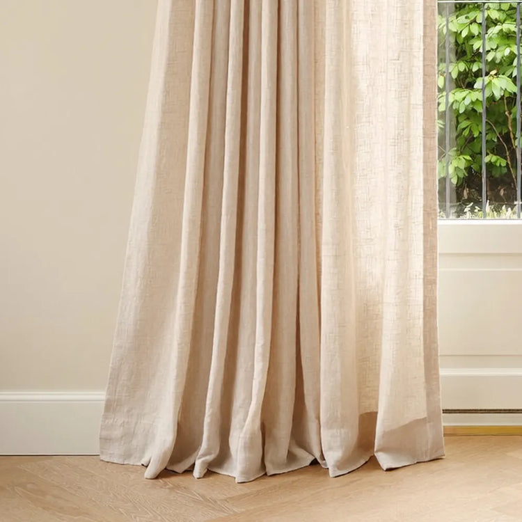 Panels are made 6"–10" longer so the fabric pools gently on the floor for a more dramatic, luxurious effect.