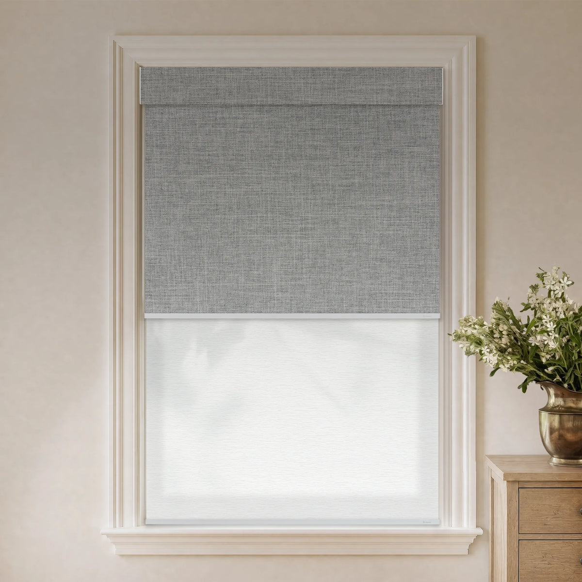 Light grey blackout dual roller shades with light filtering jacquard white fabric