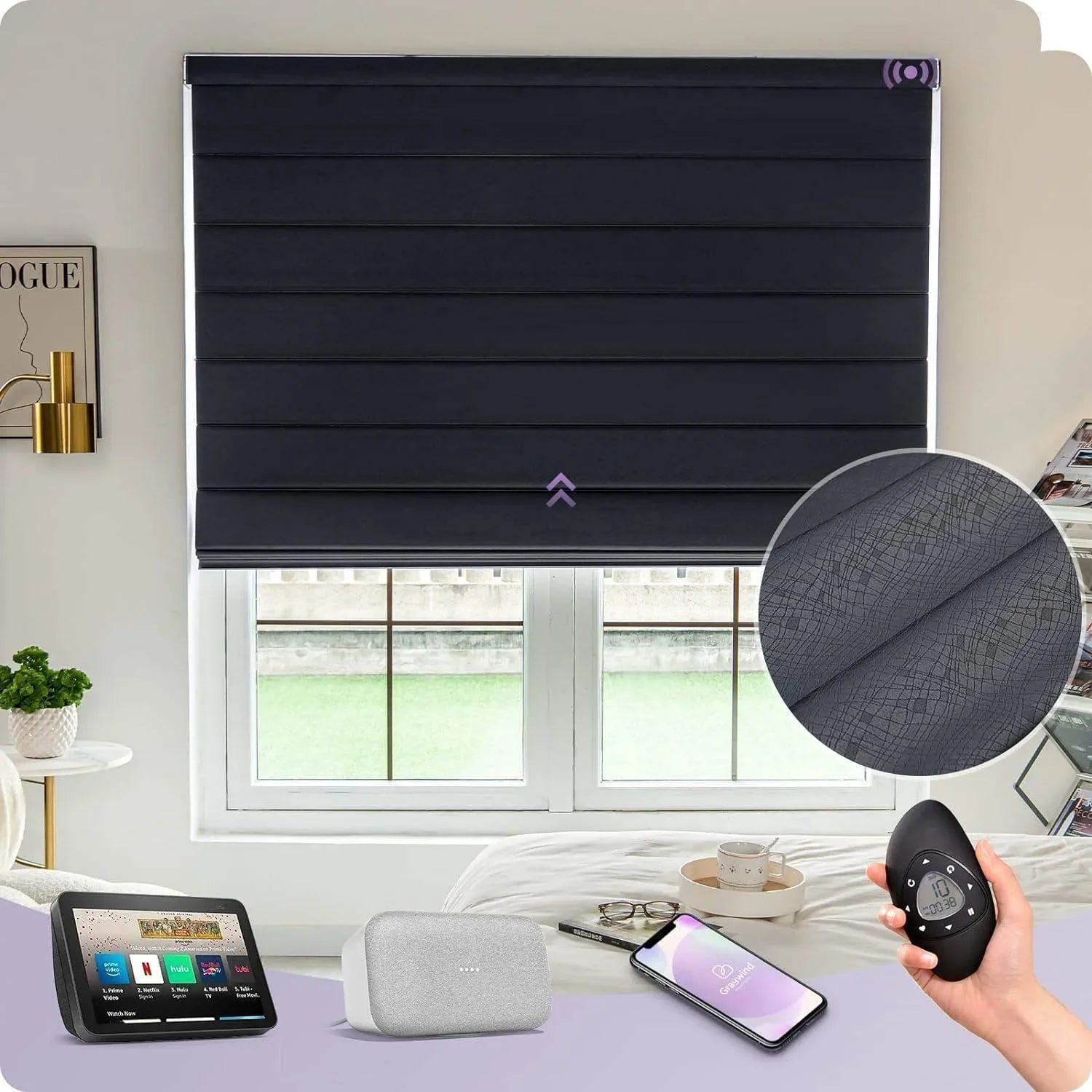 Smart black motorized window shade above window, with remote, smart speaker, and phone app controls visible, showcasing textured blackout fabric.