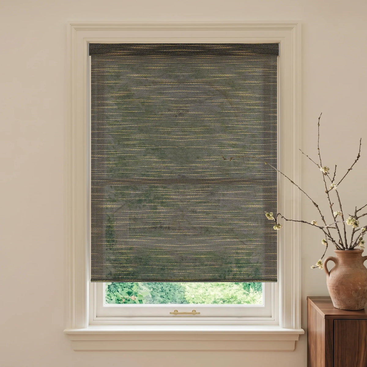 Truffle light filtering roller shades with a warm neutral fabric texture