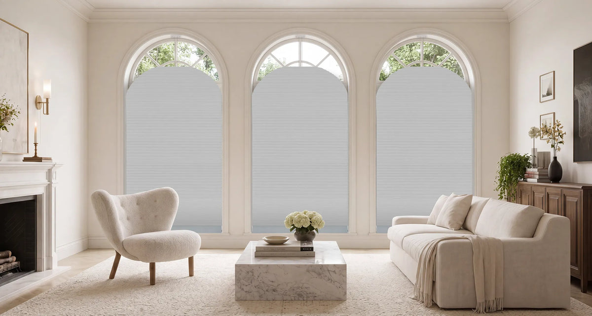 Three Motorized Elongated Arch Cellular Shades