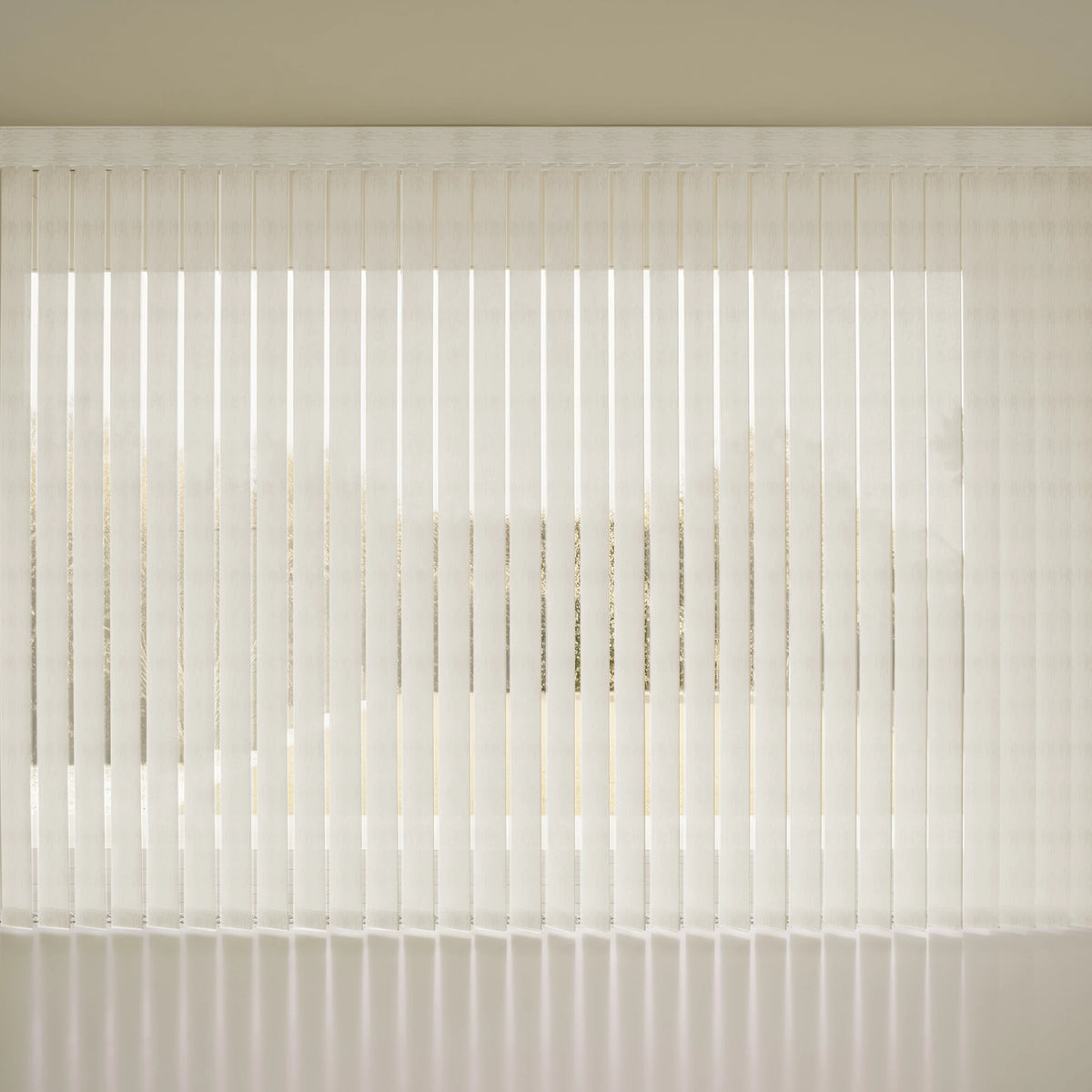 White Smart Vertical Blinds  covering a window, with soft light filtering through and a beige wall visible above.