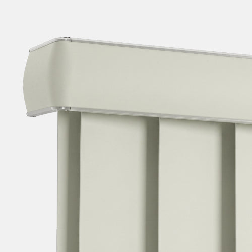 Close-up of a light beige or off-white panelled product, showing the top corner with a curved edge and vertical slatted panels against a plain light background.