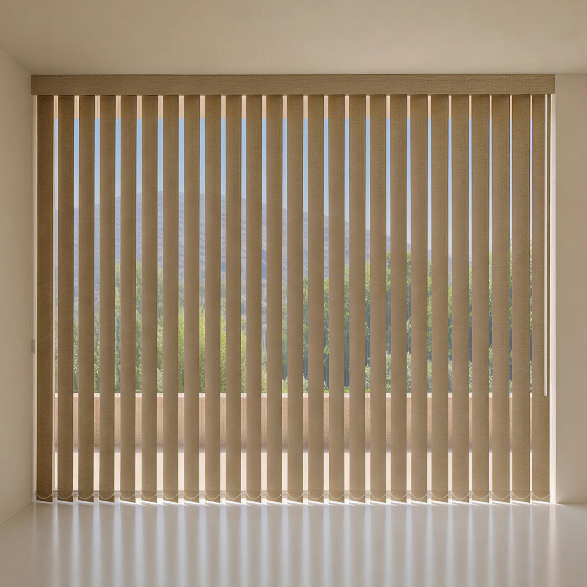 Coffee vertical blind curtains installed on a large window, shown in a minimalist interior with a view of green trees outside.