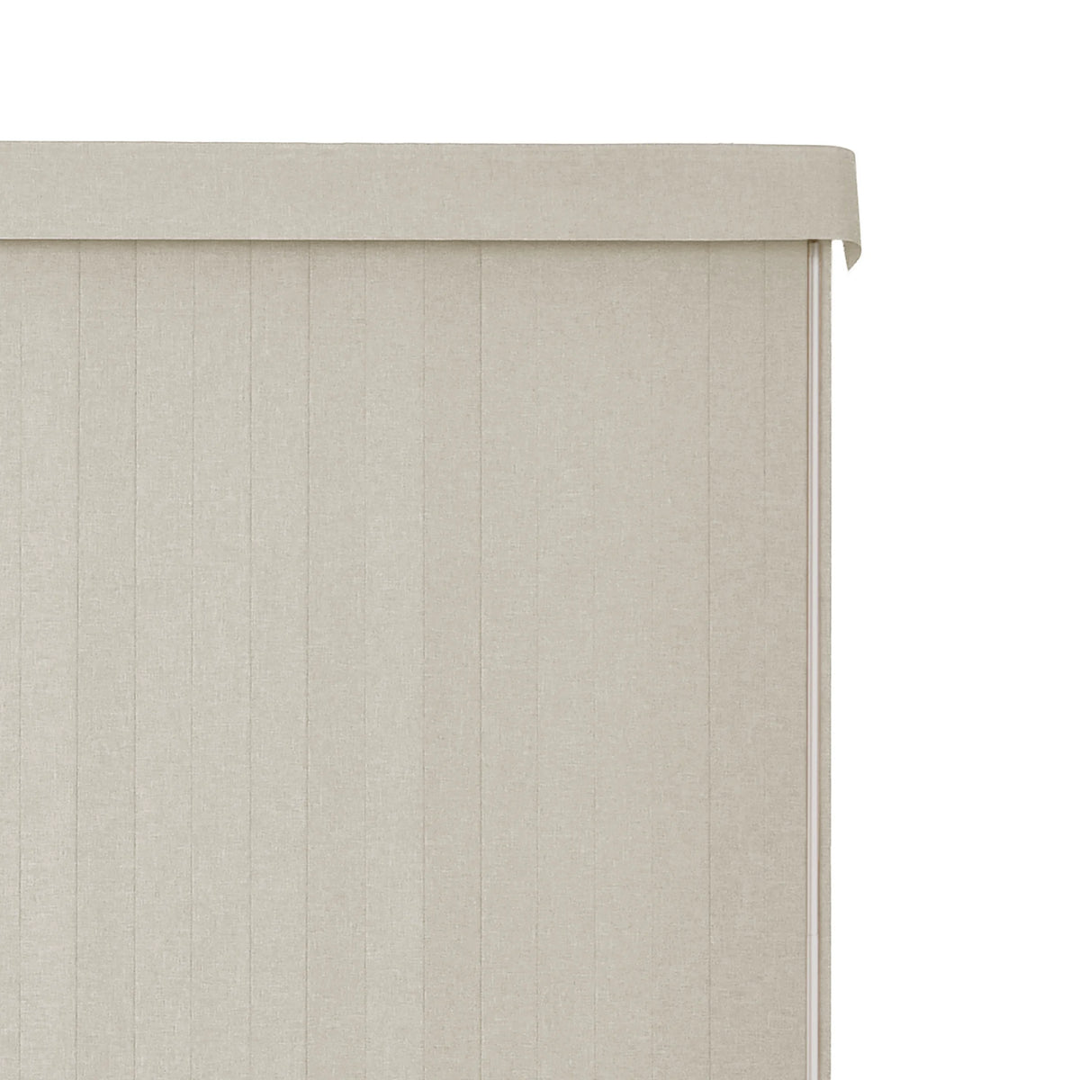 Close-up of a beige textured Vertical Blindsor curtain panel with vertical pleats and a folded top edge, shown against a white background.