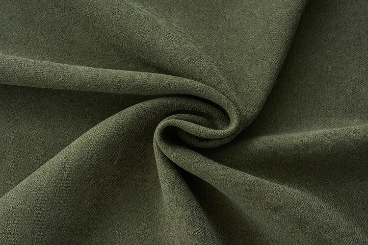 Moss green blackout curtain fabric with natural texture for Graywind motorized curtains.