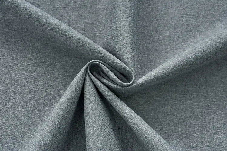 Denim blue blackout curtain fabric with refined texture for Graywind motorized curtains.