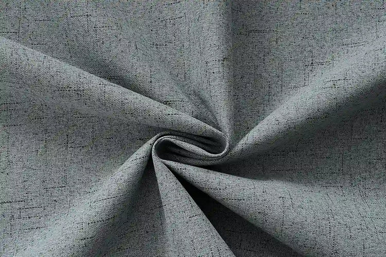 Denim blackout curtain fabric with woven streak details for motorized curtains.