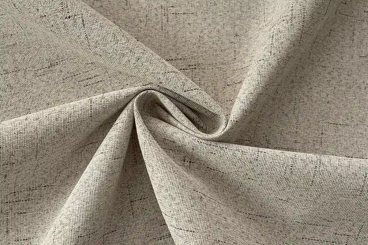 Taupe blackout curtain fabric with subtle streaked texture for custom drapes.