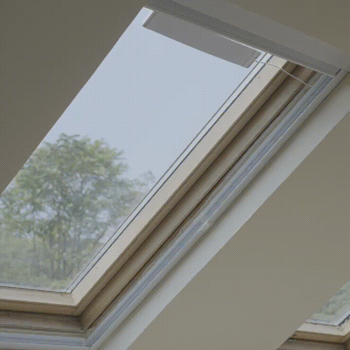 The blackout skylight shade closes securely across the window, helping reduce overhead glare, heat, and unwanted sunlight