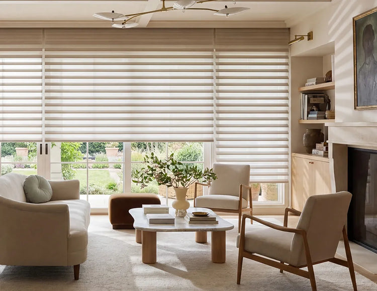 Living room with white horizontal sheer shades, furniture, and decor