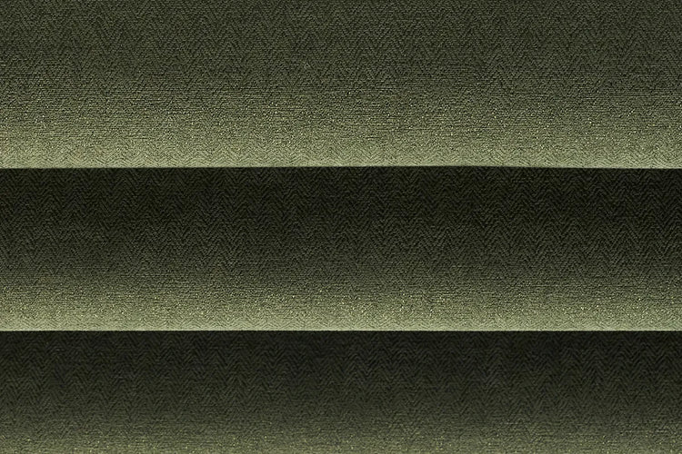 Close-up of Lush Moss blackout fabric for flat roman shades, showing deep green woven texture.