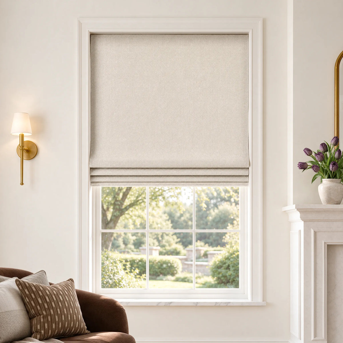 Flat Roman shades in Cadence Weave Oatmeal room-darkening fabric, partially raised on a window.