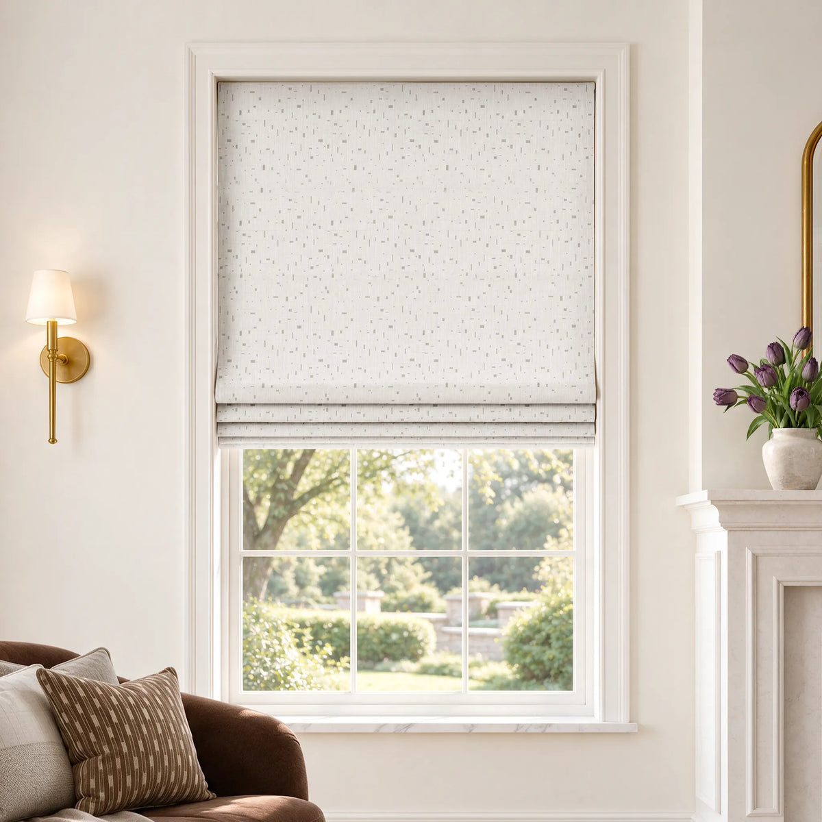 Flat Roman shades in Silver Gleam White room-darkening fabric, partially raised on a window.
