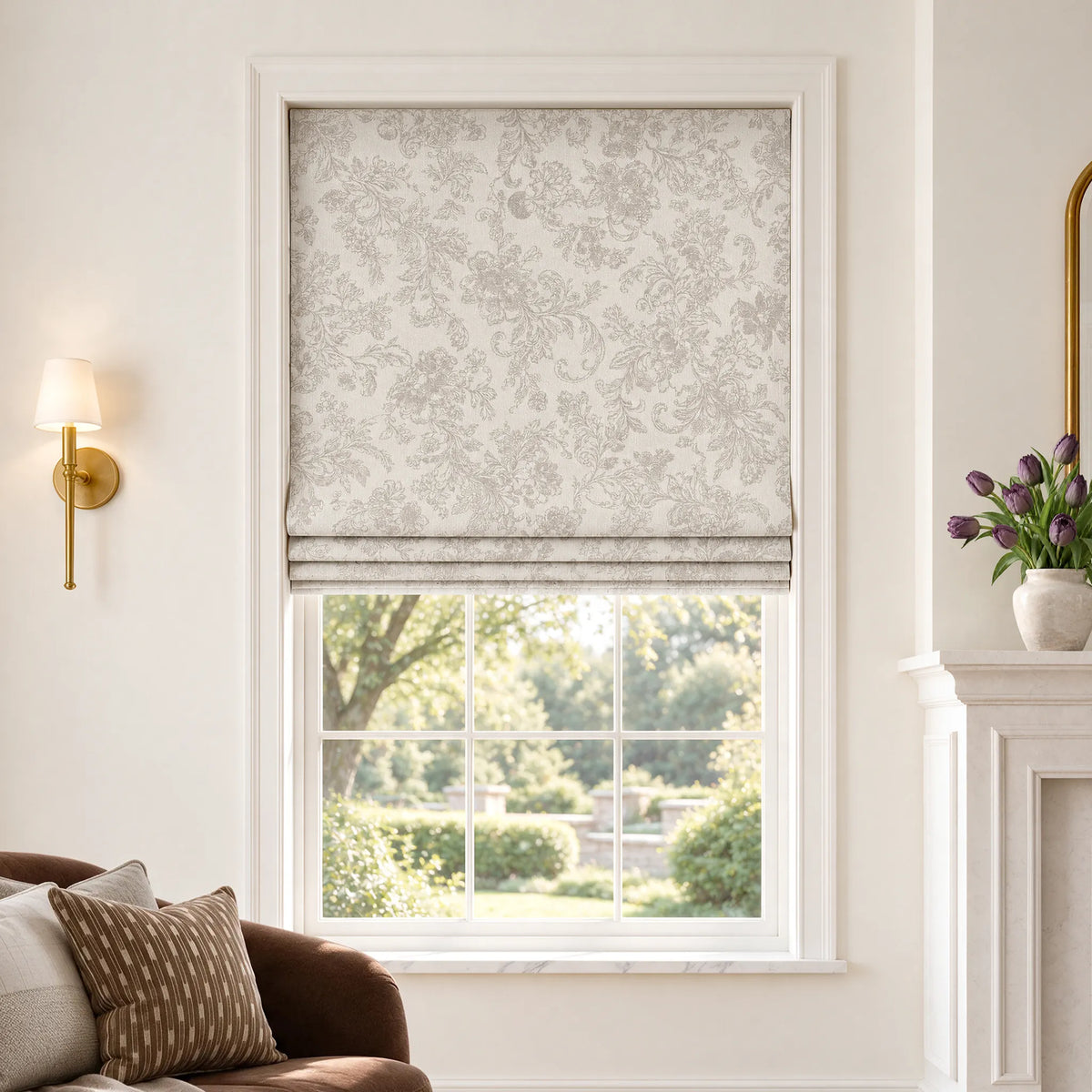 Flat Roman shades in Bloom Beige room-darkening fabric, partially raised on a window.