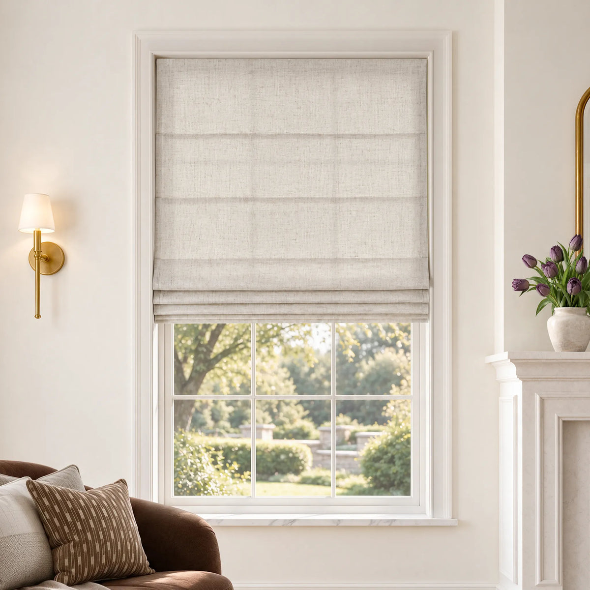 Flat Roman shades in Hush Beige light-filtering fabric, partially raised on a window.