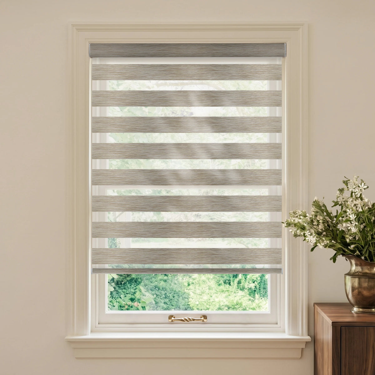 Linen Sandy motorized light-filtering zebra blind with gray-and-white alternating bands and a wood-grain texture.