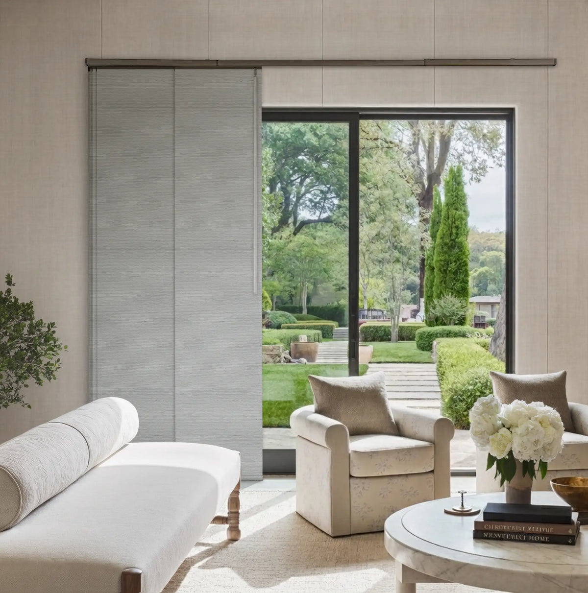 light gray blackout panel track blinds partially covering large glass doors in a modern living room