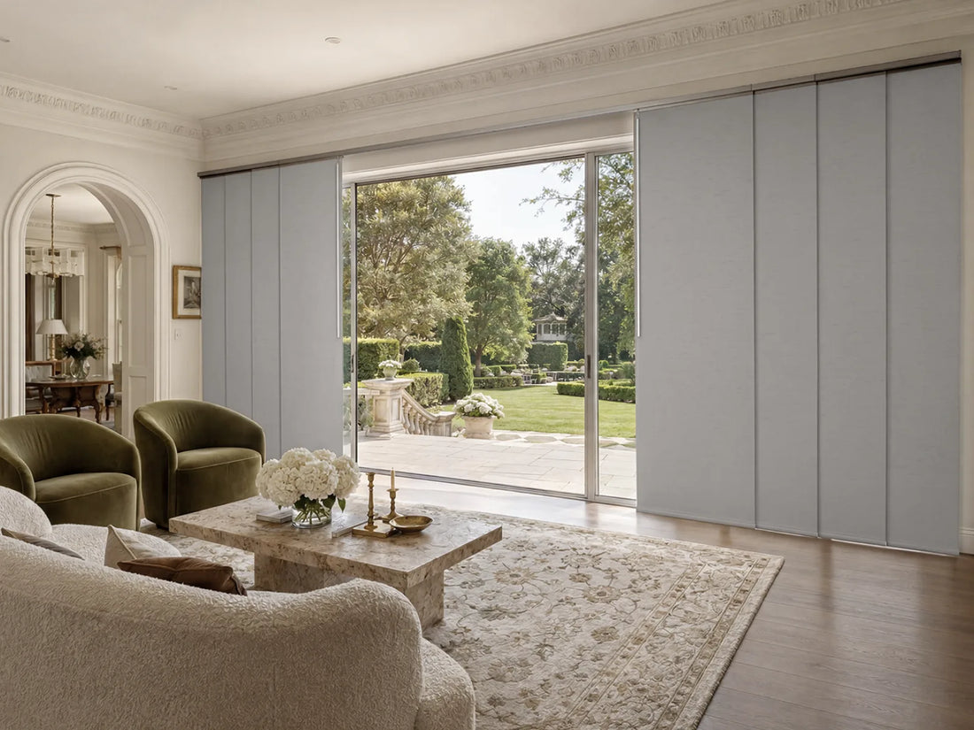 gray panel track blinds covering sliding glass doors in a warm modern living room