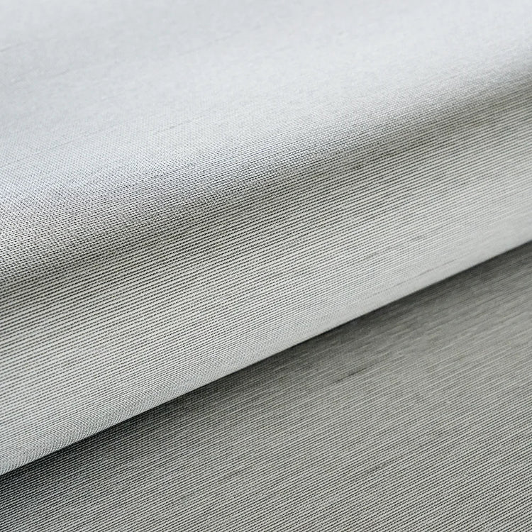 close-up of Horizon Light Grey blackout fabric with subtle gray horizontal weave