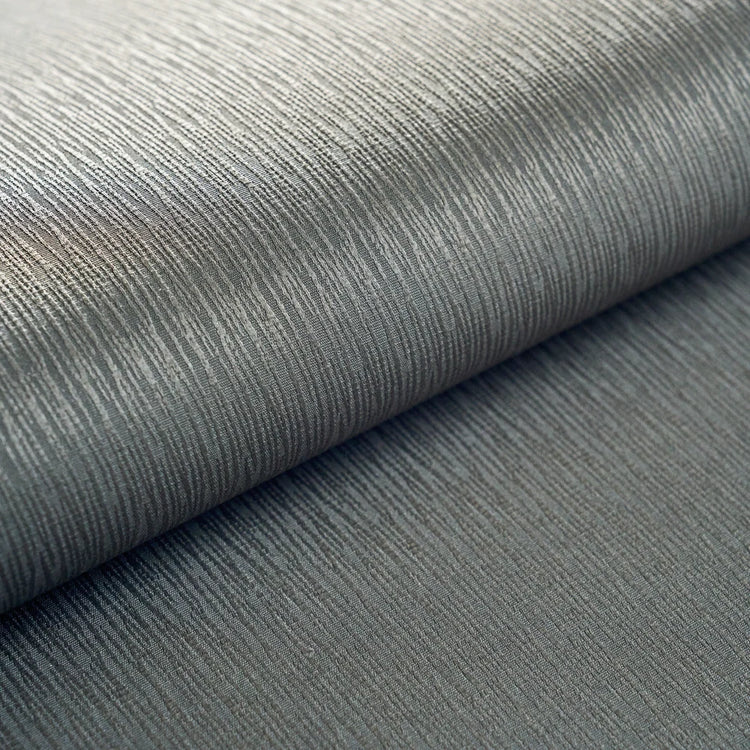 close-up of Linea Smoke blackout fabric with dark gray linear texture