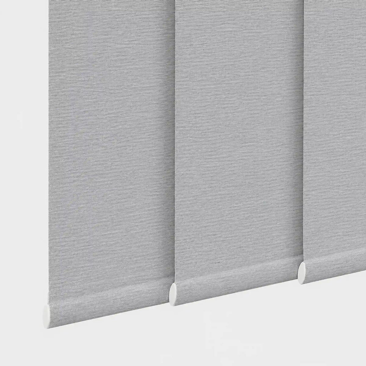 Light gray roller blind panels with a textured fabric surface, shown partially rolled down on a plain light gray background.