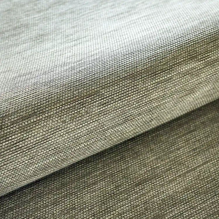 Close-up of a woven fabric texture in a warm taupe-beige color, showing the detailed weave and a folded layer.