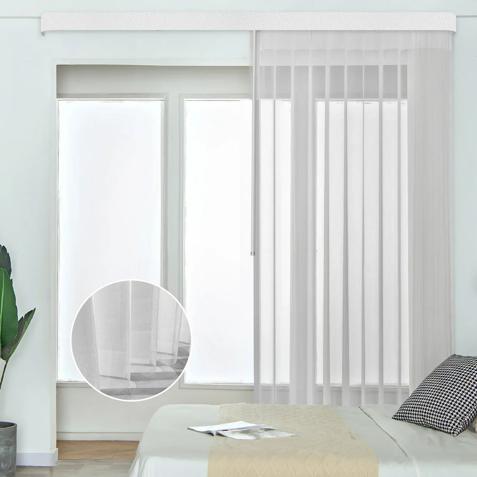 White vertical blinds in a room with a bed and plant